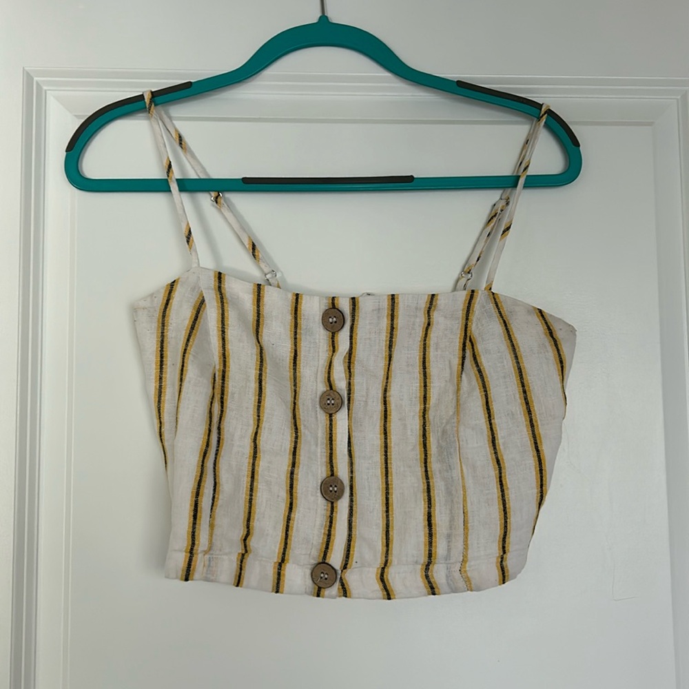 White, yellow, and black tank top